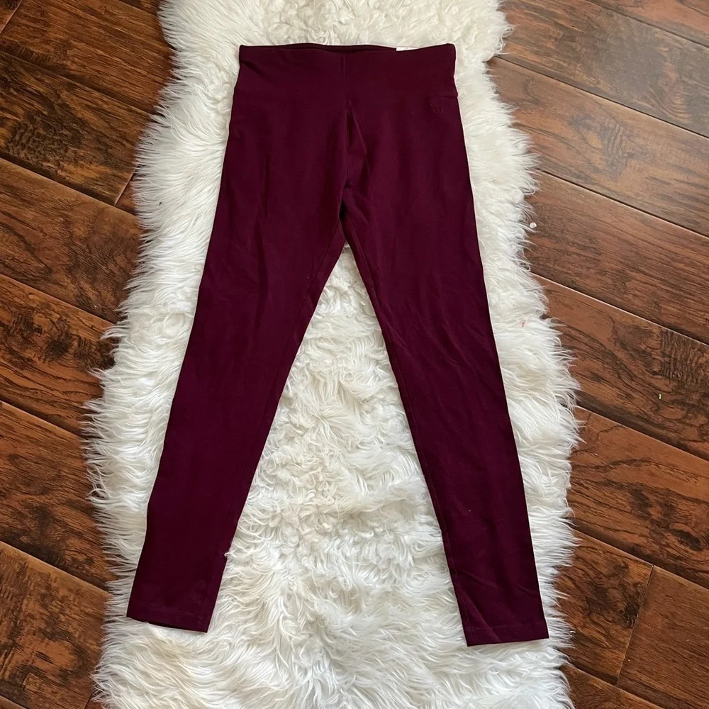Justice burgandy leggings Size 18/20